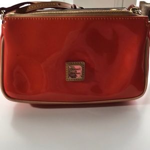 Small Dooney and Burke cross body patent bag